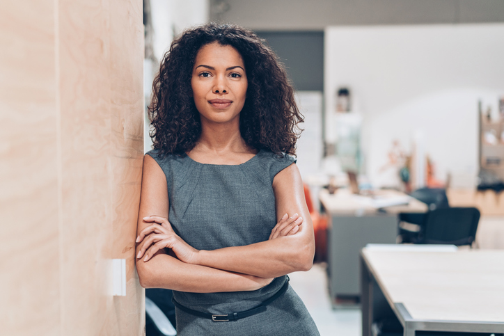 Smiling young African ethnicity businesswoman in the office